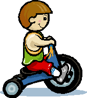 boy riding a trike